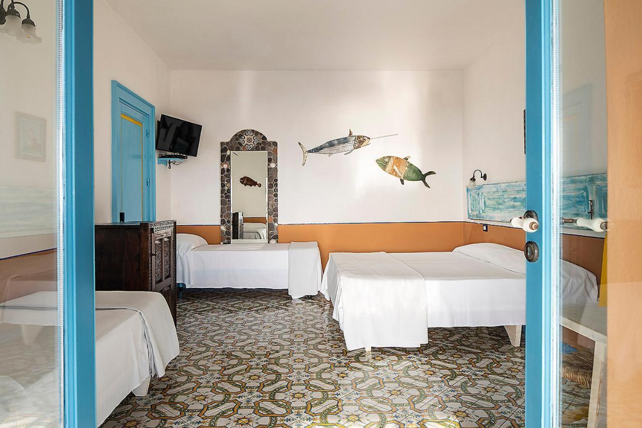 Deluxe Quadruple Room with Terrace and Sea View