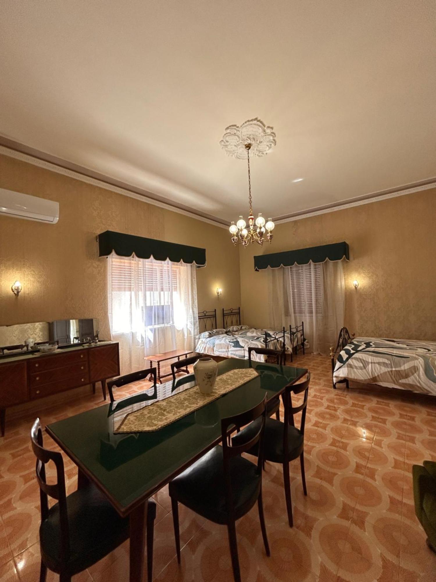Camera Quadrupla con Bagno in Comune